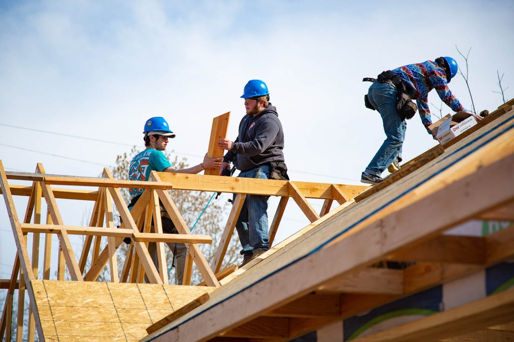 construction trade students building a house