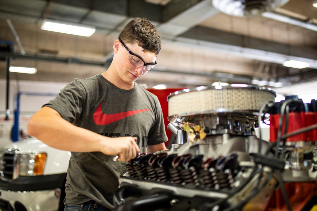 Male working on car