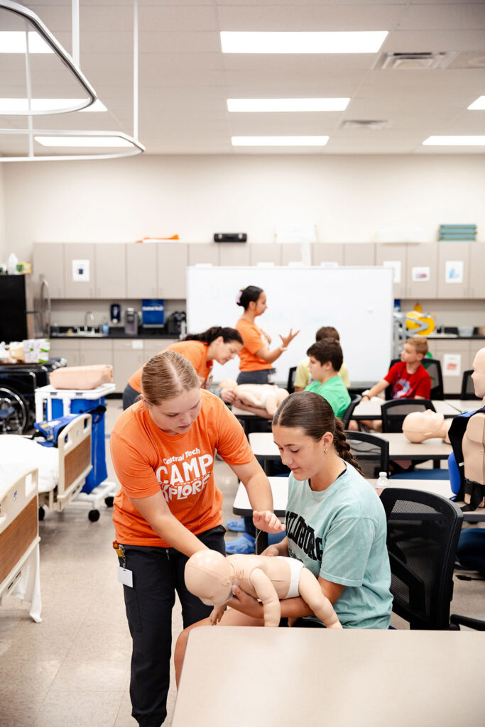 Central Tech Camp-Explorer-campers-practiced-CPR-Heimlich-on-infant-sized-mannequins Central Tech Camp Explorer campers practiced CPR and Heimlich on infant-sized mannequins.