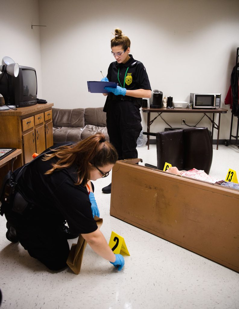 Criminal Justice students evaluate a mock crime scene