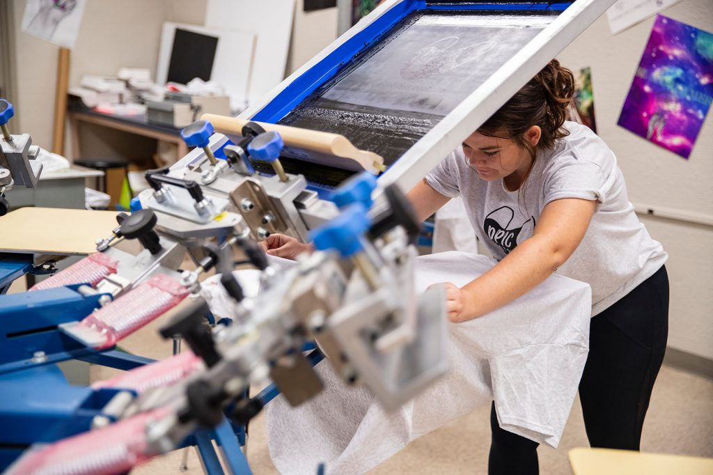 DPIC student screen printing t-shirt