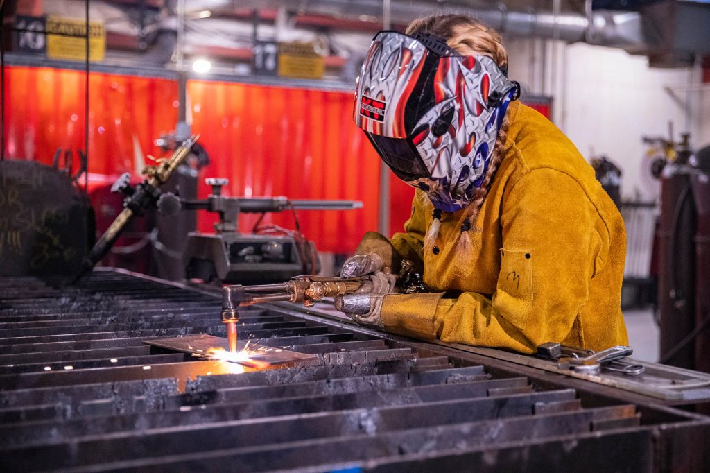 female welding student at Central Tech