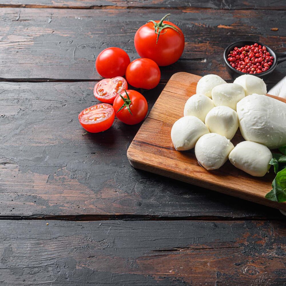 mozzarella cheese on a cutting board
